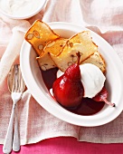 Pears poached in cranberry juice with creamy yoghurt and almond biscuits