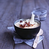 Cauliflower soup with fried bacon