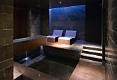Luxurious spa with relaxation couches and pool
