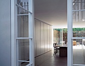 View into dining room with courtyard in background