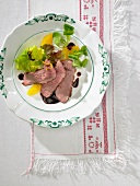 Duck breast with oranges and lamb's lettuce