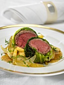 Pigeon breast wrapped in savoy cabbage