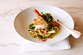 Spaghetti with scampi and rocket