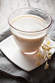 A glass of soy milk and bean sprouts