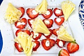 Fresh strawberries with tete de moine and sour cream