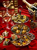 Various canapes on a cake stand