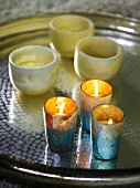 Tea light holders on tray