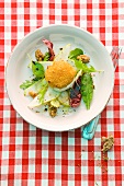 Baked Camembert on a bed of salad with pears