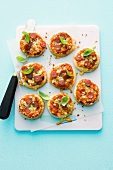 Mini-pizzas with salami