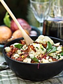 Cauliflower salad with bacon, chard and roasted almonds
