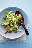 Couscous salad with sugar snap peas, mint and peppers