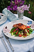 A summer salad with a fillet of salmon