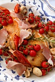 Duck with smoked ham and cherry tomatoes