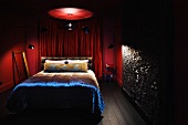 Masculine bedroom with dramatic lighting