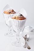 Decorated muffins in stemmed glasses