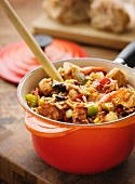 Rice casserole with chicken, pork, sausage and vegetables