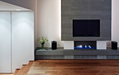 Modern fireplace with integrated flat-screen TV