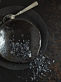 Black Hawaiian sea salt on a black plate