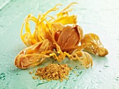 Dried nutmeg flowers and nutmeg powder