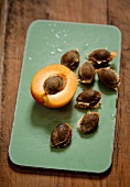 Half and apricot and apricot seeds