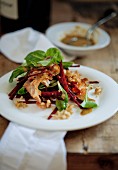 Warm salad with fried bacon