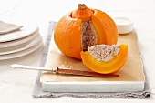 A pumpkin filled with minced meat, pistachios and rice