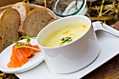 Pumpkin soup, smoked salmon and bread