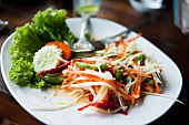 Som tom (Thai salad with green papaya, carrots, chillis, string beans)