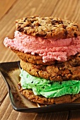 Two Toffee Cookie Ice Cream Sandwiches with Strawberry and Mint Chocolate Chip Ice Cream; Stacked