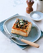 Puff pastry tartlet with mixed mushrooms and bacon
