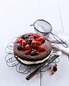Devil's food cake (chocolate cake with cream and berries)