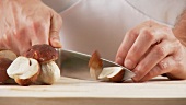 Chopping porcini mushrooms