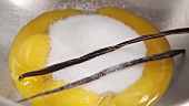 Egg yolk, sugar and vanilla pods
