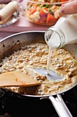Deglaze the pan with milk