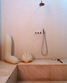 Designer bathroom with erotic sculptures