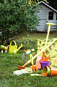 Garden tools & garden ornaments on lawn