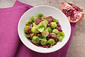 Sprouts with lamb and pomegranate seeds