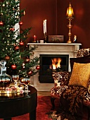Room decorated for Christmas with a roaring fire