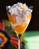 Orange dessert with cream