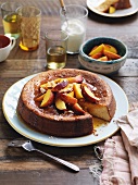 Yoghurt & almond cake with caramelised peaches