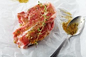 Raw Lamb Chop with Marinade and Oregano