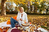 Woman at autumn picnic