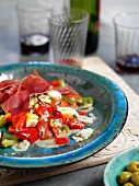 Tomato and pepper salad with boiled egg and ham