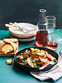 Squid with chorizo and parmesan croutons