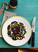 Red beet carpaccio with blood oranges, feta and herbs