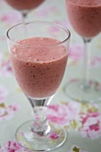 Cranberry and Strawberry Smoothies in Stem Glasses