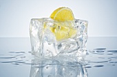 Half a lemon in a block of ice