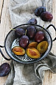 Plums in an old-fashioned enamel pot