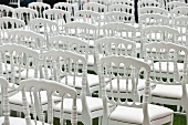 White chairs on lawn