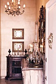 Half-height cabinet against stone wall in grand room